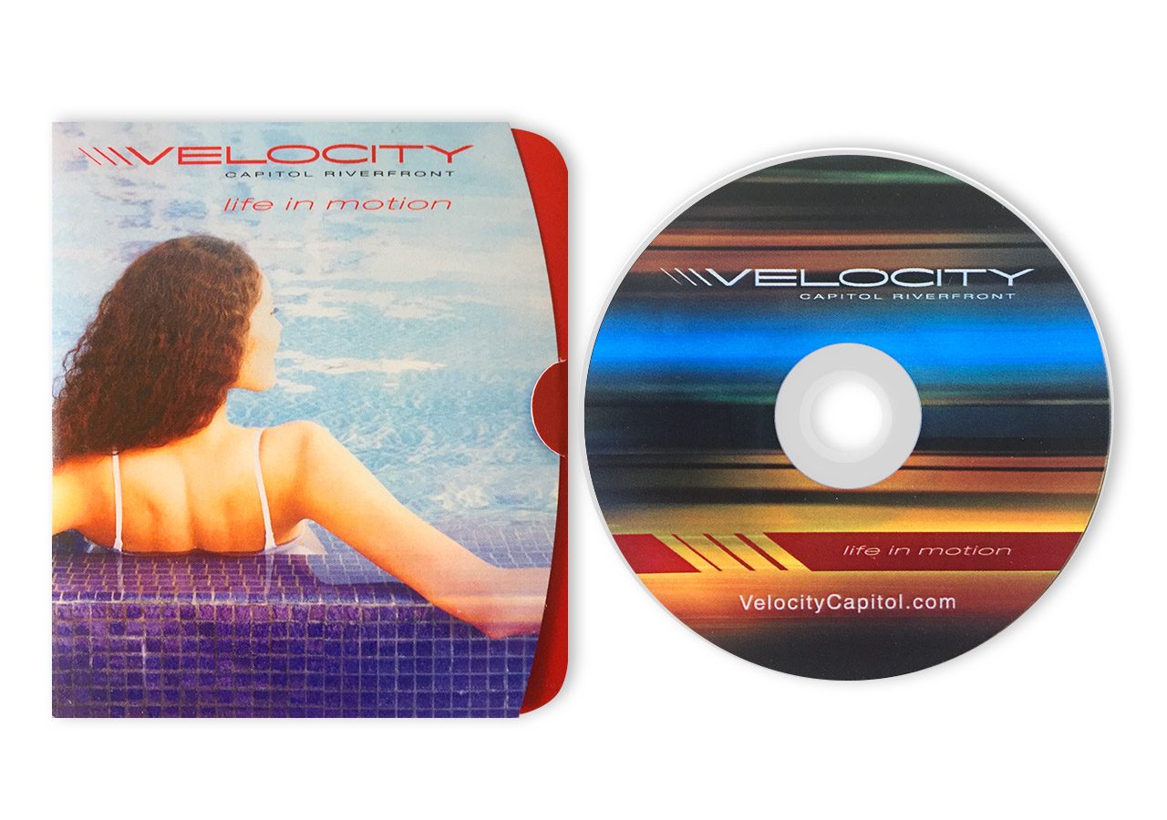 A DVD case and disc for the movie "Velocity" featuring a woman looking out at a scenic view with text on the case.
