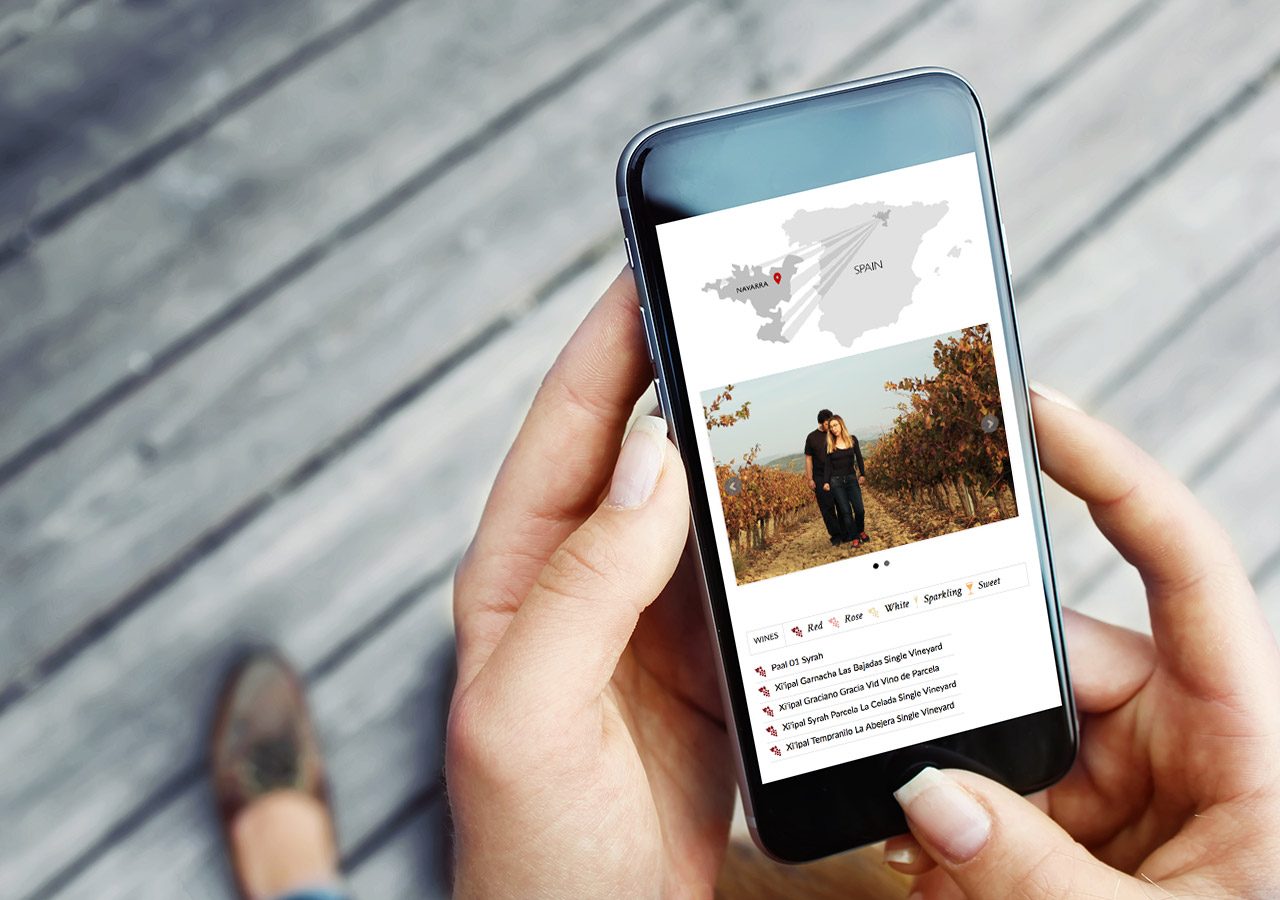 Person holding a smartphone displaying a social media post with a photo and text.