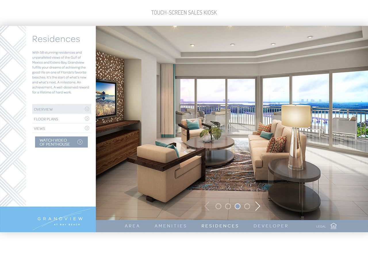 Spacious, modern hotel room with large windows offering scenic ocean views and elegant, comfortable furnishings.